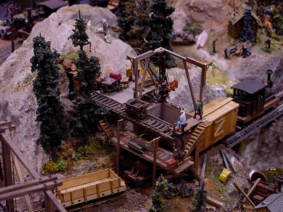 Emmett J. Brannan of Cache Creek Scale Models had this great HO and HOn3 display layout at his booth.